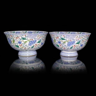 A FINE PAIR OF CHINESE PORCELAIN BOWLS FAMILLE ROSE: THE PAIR OF BOWLS IS ENAMELED WITH LOTUS MOTIFS IN PASTEL COLORS. THE BOWLS ARE 6 INCHES WIDE AND 4 INCHES TALL. IN VERY GOOD CONDITION. QIANLONG MARK ON BOTTOM. WE PROVIDE IN-HOUSE SHIPPING FOR YOUR