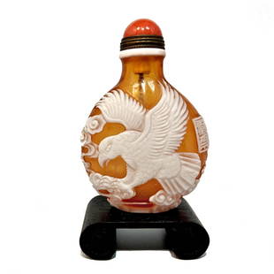 SUPERB CARVED CHINESE PEKING GLASS SNUFF BOTTLE EAGLE QIANLONG SEAL: THE BEAUTIFULLY CHINESE CARVED RARE SNUFF BOTTLE DEPICTS AN EAGLE AND A PINE TREE. IT BEARS A QIANLONG SEAL. THE BOTTLE IS 3 INCHES TALL. PROVENANCE: PRIVATE FLORIDA COLLECTION. WE PROVIDE INHOUSE SHI