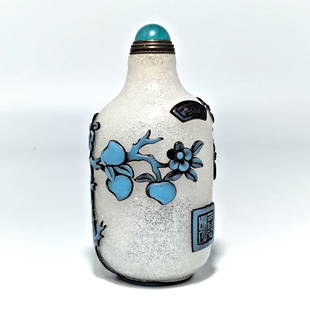FINE CHINESE PEKING GLASS SNUFF BOTTLE DEER SIGNED QIANLONG SEAL: THE WONDERFUL CHINESE SNUFF BOTTLE IS FINELY CARVED IN THREE LAYERS OF GLASS IT DEPICTS A DEER AND A PEACH TREE, ARTIST SIGNED AND BEARING THE QIANLONG SEAL. THE BOTTLE IS 3.25 INCHES TALL. STANDS ARE