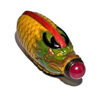 CHINESE FIGURAL DRAGON ENAMEL PEKING GLASS YELLOW SNUFF BOTTLE: THE WELL CHINESE CARVED SNUFF BOTTLE IS SHAPED AS A DRAGON. IT IS ENAMELED OVER THE CARVED YELLOW GLASS. THE BOTTLE IS 3.5 INCHES LONG. STANDS ARE FOR DISPLAY ONLY, NOT INCLUDED UNLESS OTHERWISE STATE