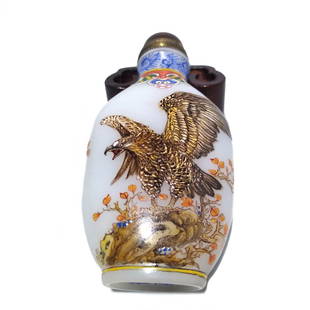 EXQUISITE CHINESE ENAMEL ON GLASS SNUFF BOTTLE EAGLE QIANLONG MARK: THE EXQUISITE CHINESE ENAMELED SNUFF BOTTLE DEPICTS TWO SCENES FEATURING GLORIOUS EAGLES. THE BOTTLE BEARS A QIANLONG DATE MARK. IT IS 3 INCHES TALL. STANDS ARE FOR DISPLAY ONLY, NOT INCLUDED UNLESS