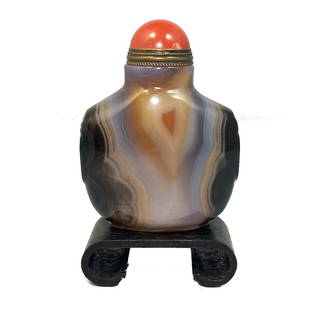 FANTASTIC CHINESE CARVED AGATE SNUFF BOTTLE: THE FANTASTIC CHINESE SGATE SNUF BOTTLE IS SO WELL CARVED, THIS BOTTLE HAS BEAUTIFUL BANDS OF HARMONIOUS COLORS. THE SHOULDERS ARE CARVED WITH RINGED MASKS. THE FOOT IS WELL DEFINED. THE BOTTLE IS