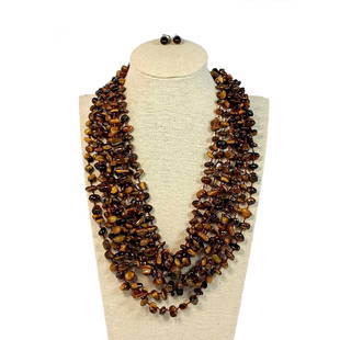 AN EXQUISTE VINTAGE TIGER'S EYE NECKLACE 8 STRAND AND EARRINGS JAY KING: THE EXQUISTE LOT FEATURES A FABULOUS VINTAGE 8 STRAND NECKLACE TIGER' EYE STONE AND A SUPERB SILVER, TIGER'S EYE PAIR OF EARRINGS , ATTRIBUTED TO JAY KING. THE SHORT STRAND IS 16" AND THE LONGEST IS