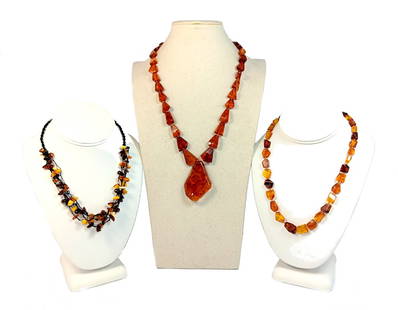 SUPERB LOT OF 3 AMBER NECKLACES 80gr: THIS LOT FEATURES 3 SUPERB AMBER NECKLACES. TOTAL WEIGHT 80gr. SIZE 17", 18" AND 23" (PENDANT 2.25" BY 1.5"). PROPERTY OF A FLORIDA COLLECTOR. WE PROVIDE IN-HOUSE SHIPPING.