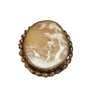 A BEAUTIFUL VICTORIAN BROOCH SHELL CAMEO SCENIC FIGURAL: THIS IS S RARE AND BEAUTIFULLY CARVED SHELL CAMEO VICTORIAN BROOCH IT DEPICTS A BOY FISHING WITH HIS DOG!THE CAMEO IS 1.5 BY 1.4 INCHES. WE PROVIDE IN-HOUSE AND COMBINED SHIPPING.