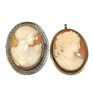 A BEAUTIFUL LOT 2 BROOCHES SHELL CAMEO VERY FINELY CARVED: THIS IS A LOT OF TWO FINELY CARVED SHELL CAMEOS. ONE IS UNUSUAL, FROM THE 1930'S WITH A BOB HAIR STYLE. THE CAMEO WITH THE PEARL NECKLACE IS SET IN SILVER AND IT CAN BE WORN AS A PENDANT AS WELL.