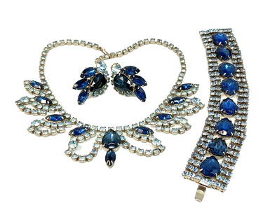 A GORGEOUS JULIANA PARURE BLUES, VINTAGE MID CENTURY JEWELRY: OFFERED HERE IS A HIGH END PARURE OF A BRACELET, NECKLACE AND EARRINGS,FEATURING GREAT STONES IN BLUE TONES. ATTRIBUTED TO JULIANA. THE BRACELET IS 7.25" LONG. THE NECKLACE IS 15" LONG. WHAT A