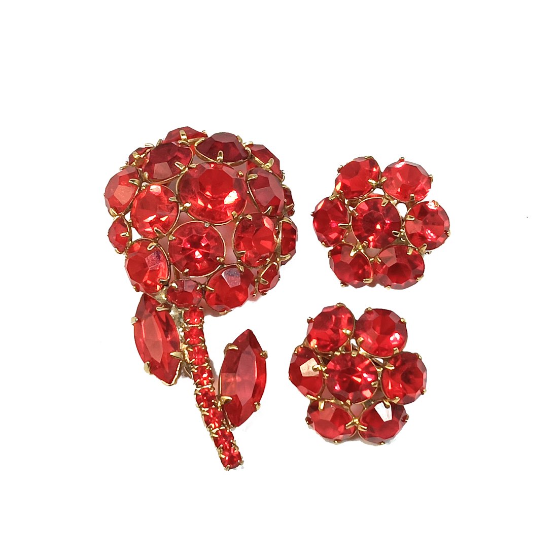 A SUPERB VINTAGE SET OF BROOCH EARRING RED RHINESTONES IN PRONGS: THE BEAUTIFUL VINTAGE SET CONSIST OF A FLOWER BROOCH RED RHINESTONES IN PRONGS AND A PAIR OF EARRINGS. THE BROOCH IS 2.25" BY 1.1". PROPERTY OF A FLORIDA COLLECTOR. WE COMBINE/PROVIDE IN-HOUSE SHIPPIN