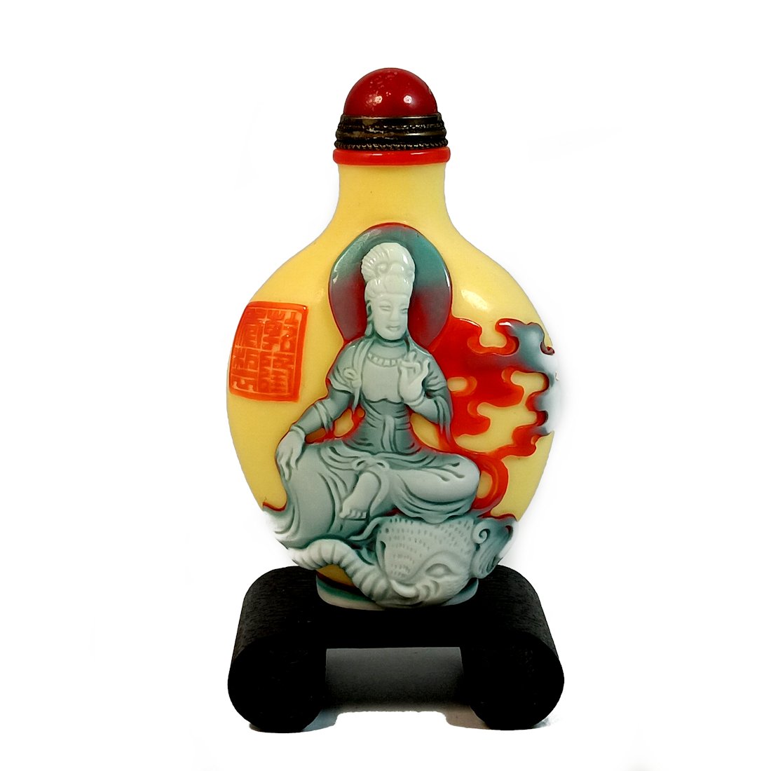 EXQUISITE CHINESE SNUFF BOTTLE GLASS QUANYIN QIANLONG SEAL: THE EXQUISTE CARVED CHINESEPEKING GLASS SNUFF BOTTLE DEPICTS ON ONE SIDE THE QUANYIN IN MEDITATION, SEATED ON A LOTUS. ON THE OTHER SIDE IS QUANYIN SEATED ON AN ELEPHANT, IN MEDITATION, WITH MUCH FINE