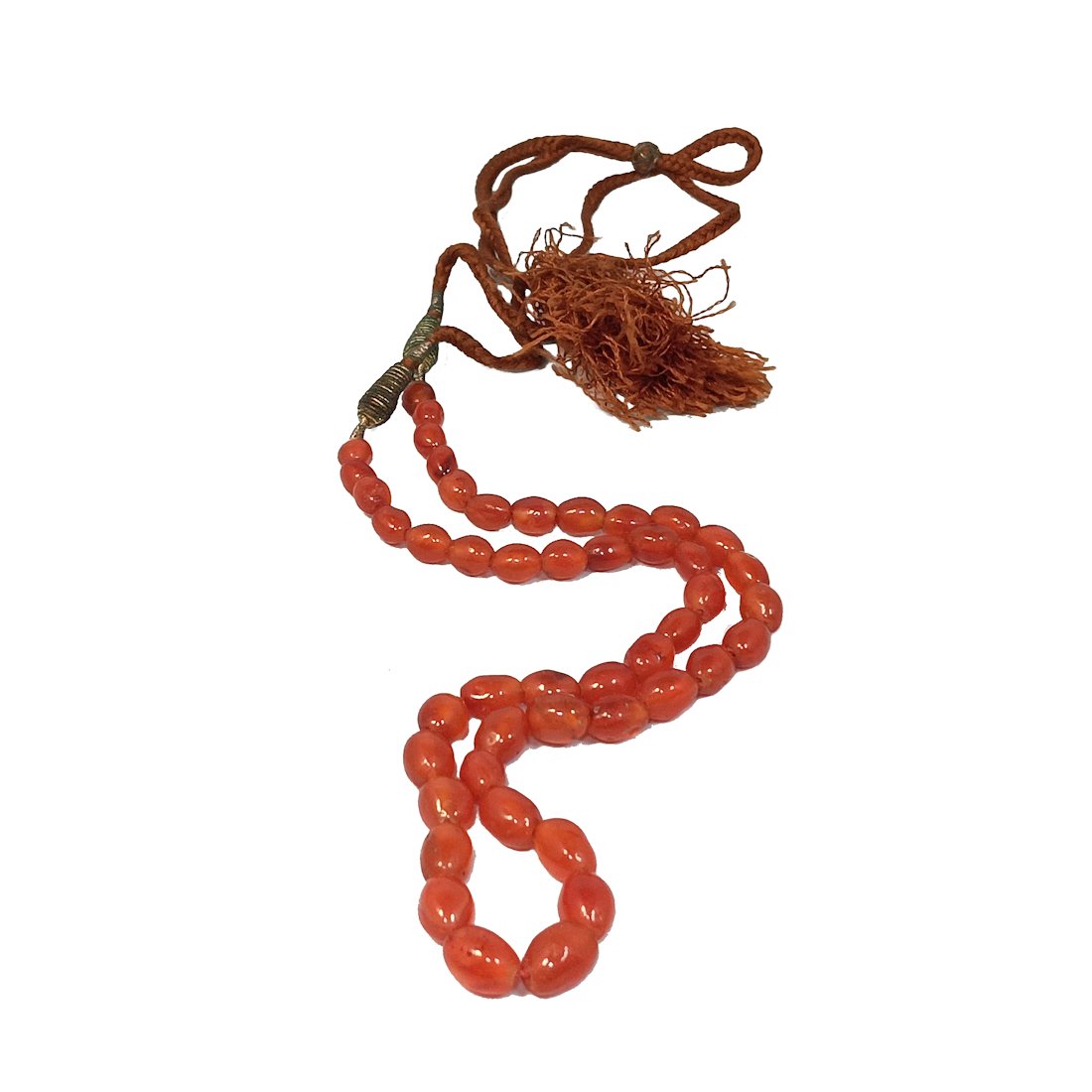 AN OLD NECKLACE OF GRADUATED OVAL CARNELIAN BEADS: THE NECKLACE IS 18" LONG PLUS A MUCH LONGER ADJUSTABLE CORD. WE PROVIDE IN-HOUSE COMBINED SHIPPING FOR A SEAMLESS TRANSACTION.