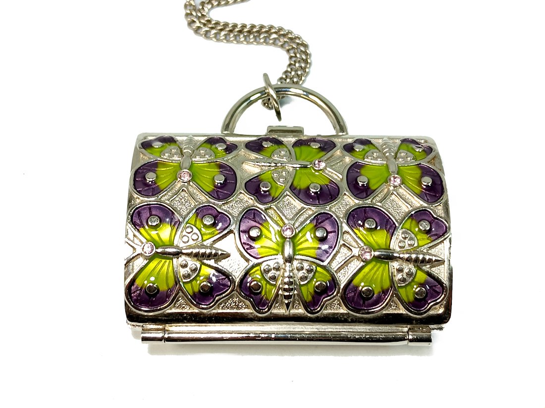 A BEAUTIFUL VINTAGE JUDITH LIEBER MINI PURSE ON NECKLACE: THE JUDITH LIEBER MINI PURSE, FOR PILLS, PERFUME OR CHANGE, MADE FOR NIEMAN MARCUS. IT IS 2.5 INCHES LONG AND 2.25 INCHES WIDE. THE CHAIN IS 28" LONG. WE PROVIDE IN-HOUSE/COMBINED SHIPPING AND A SEAML