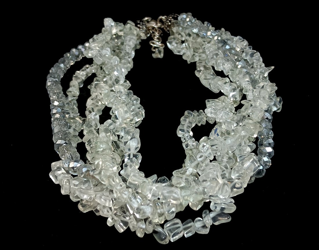 A 6 STRAND NECKLACE OF ROCK QUARTZ AND CRYSTAL 18" ADJUSTABLE LENGTH: OFFERED HERE IS A GORGEOUS QUARTZ AND CRYSTAL NECKLACE. IT IS 18" LONG WITH THE EXTENDER, IT CAN BE WORN SHORTER. IT WEIGHS 179 GRAMS. WE PROVIDE IN-HOUSE/COMBINED SHIPPING FOR A SEAMLESS CHECKOUT.