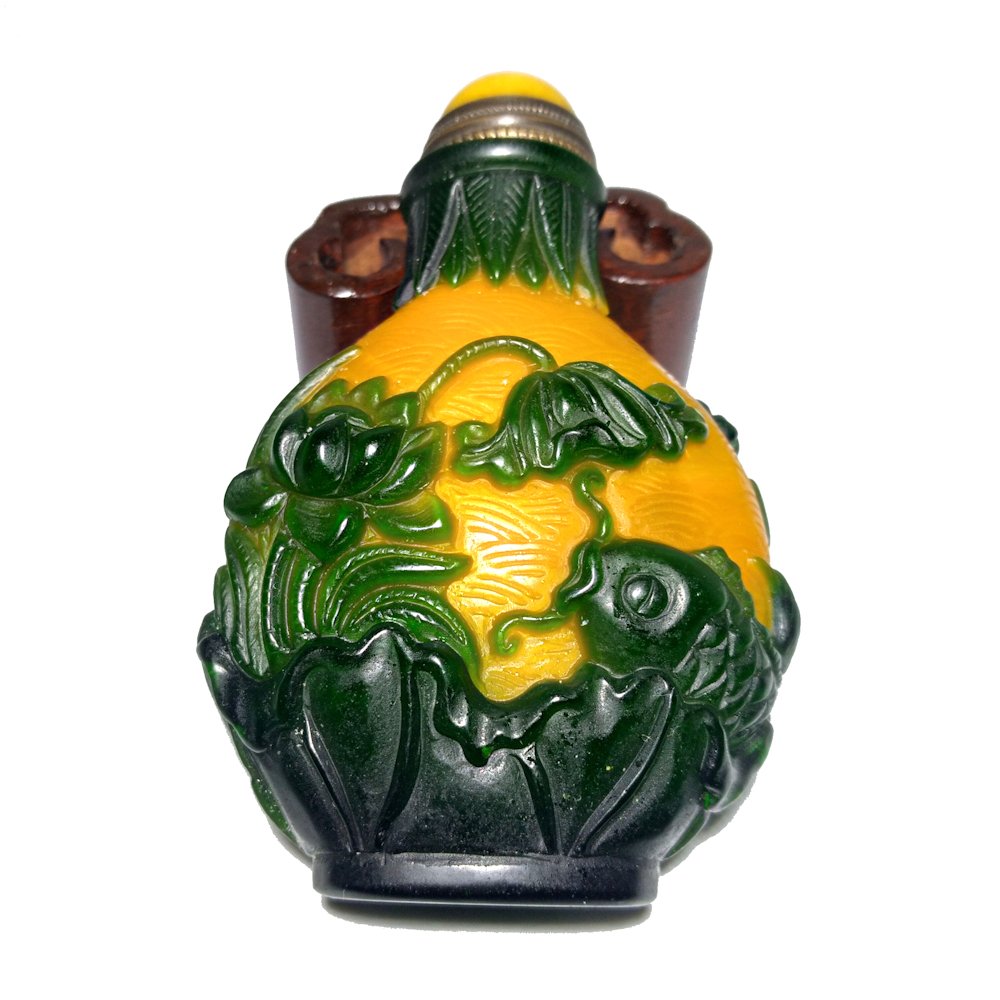 BEAUTIFUL CHINESE PEKING GLASS SNUFF BOTTLE WELL CARVED FISH BIRD LOTUS: THE BEAUTIFUL CHINESE SNUFF BOTTLE FEATURES FISH AND LOTUS ON ONE SIDE AND ON THE OTHER BIRD AND LOTUS. IT IS FOOTED. THE BOTTLE IS 2.75 INCHES TALL. STANDS ARE FOR DISPLAY ONLY, NOT INCLUDED UNLESS O