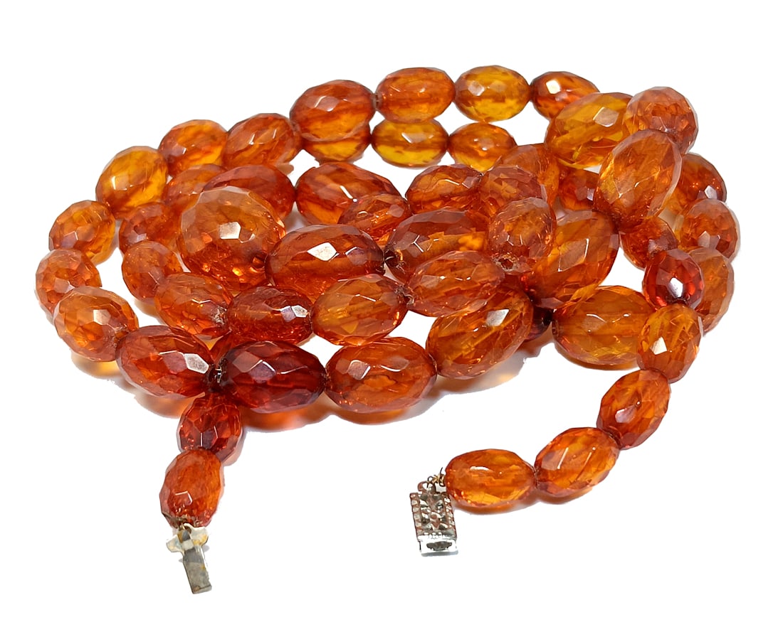 A VERY LARGE ANTIQUE NATURAL FACETED BALTIC AMBER NECKLACE 36" 61 GRAMS: A VERY LARGE, ANTIQUE, NATURAL FACETED AND GRADUATED BALTIC AMBER NECKLACE. IT IS 36" LONG AND IT WEIGHS 61 GRAMS!ALL OUR AMBER IS TESTED. WE PROVIDE IN-HOUSE COMBINED SHIPPING FOR YOUR CONVENIENCE.