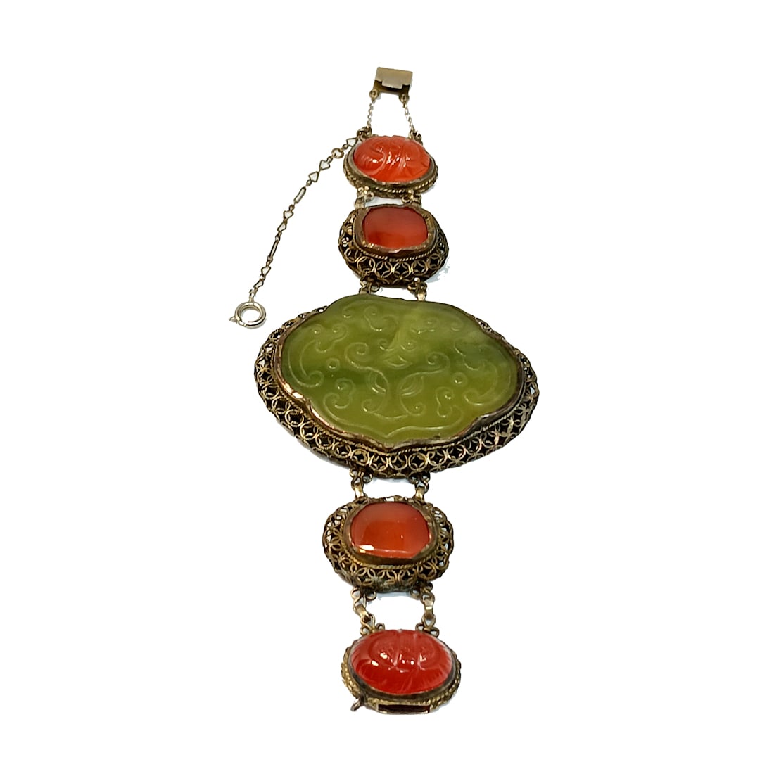 CARVED JADE CARNELIAN BRACELET ANTIQUE CHINESE EXPORT 19TH CENTURY: OFFERED HERE IS A LARGE AND EXQUISITE CARVED JADE CARNELIAN BRACELET ANTIQUE CHINESE EXPORT 19TH CENTURY. IT IS 6.75" LONG AND IT WEIGHS 58.5 GRAMS. THE CENTERPIECE IS 2.5 INCHES WIDE. IT IS SET IN SI