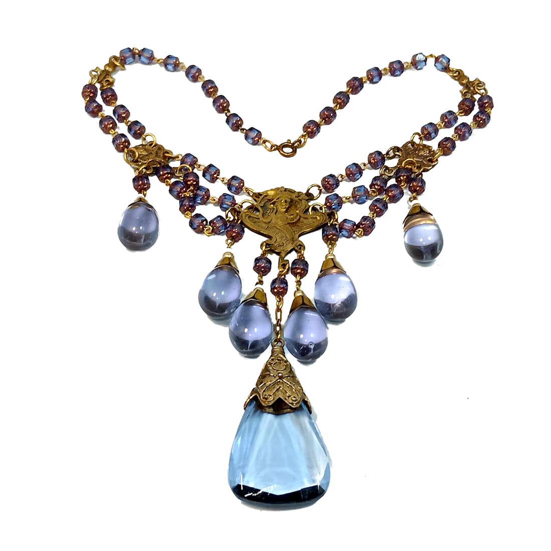 A MAGNIFICENT ART NOUVEAU CZECH NECKLACE 16" PURPLE GLASS: OFFERED HERE IS LARGE AND MAGNIFICENT ART NOUVEAU CZECH NECKLACE. IT IS SIGNED CZECHOSLOVAKIA. THE NECKLACE MEASURES 16" INCHES IN TOTAL WEARABLE LENGTH. THE LENGTH OF THE CENTERPIECE TOGETHER WITH TH