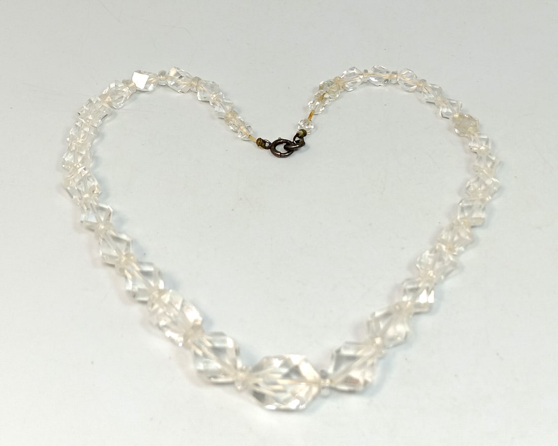 A STRAND OF ART DECO ANTIQUE NECKLACE FACETED QUARTZ CRYSTAL 16": THE NECKLACE HAS A STERLING CLASP. IT IS 16" LONG AND IT WEIGHS 44 GRAMS. WE PROVIDE IN-HOUSE/COMBINED SHIPPING FOR YOUR CONVENIENCE.