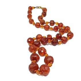 ANTIQUE NECKLACE OF NATURAL BALTIC FACETED GRADUATED  AMBER BEADS
