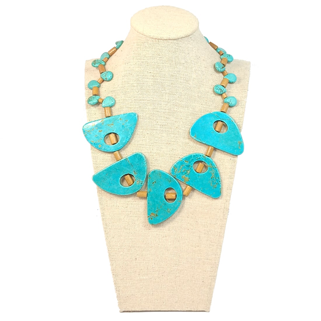 AN EXQUISITE SOUTHWESTERN TURQUOISE AND WOOD NECKLACE: OFFERED HERE IS A STUNNING SOUTHWESTERN TURQUOISE AND WOOD NECKLACE. THE WEARABLE LENGTH IS 19". WE TEST ALL OUR STONES WITH THE PRESIDIUM GEM TESTER, AND SOME ADDITIONAL TEST DEPENDING ON THESTONE. W