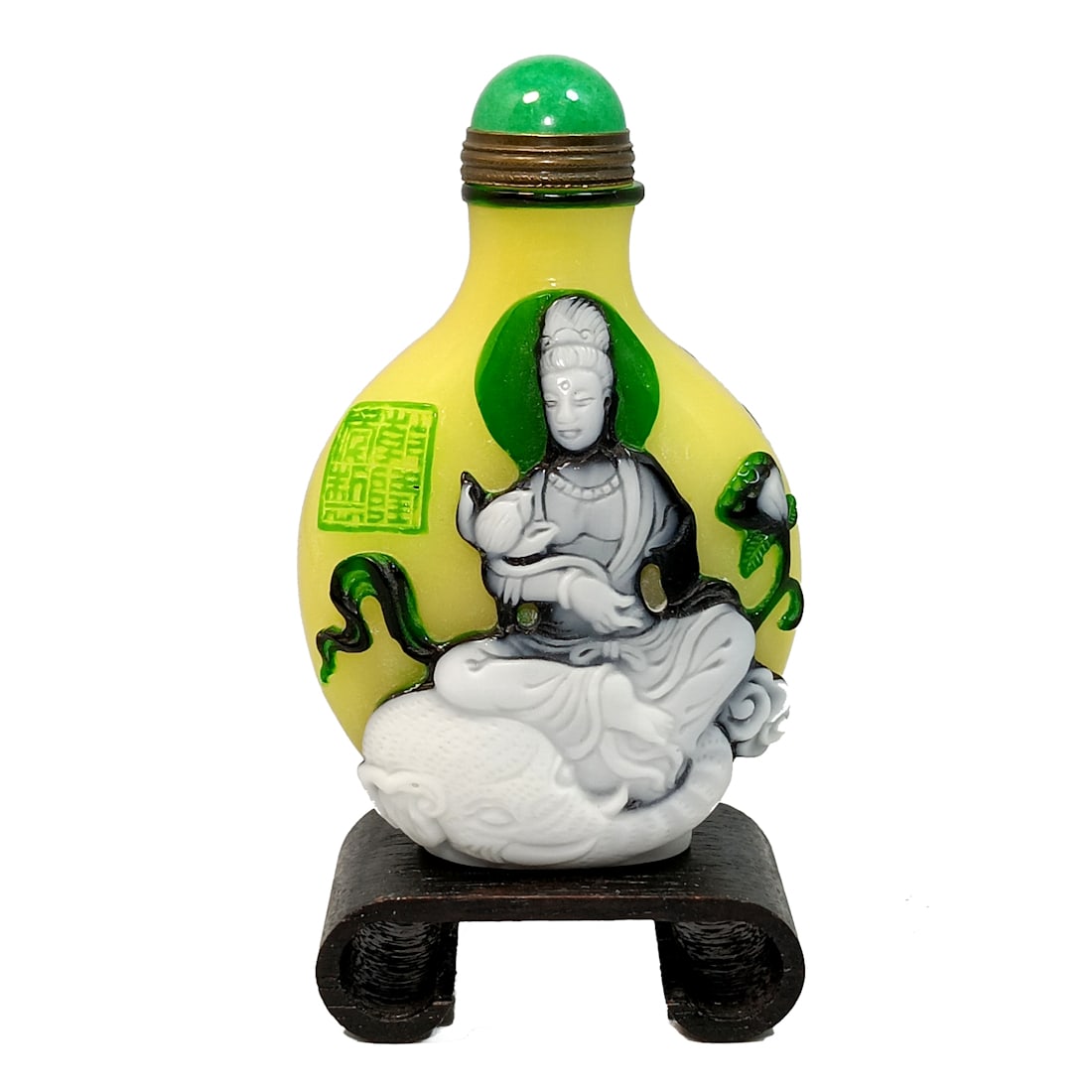 A VERY FINE CHINESE PEKING GLASS SNUFF BOTTLE GUANYIN ELEPHANT QIANLONG SEAL: THE VERY FINE CHINESE SNUFF BOTTLE IS SO WELL CARVED IN 4 LAYERS OF GLASS WITH AN IMPERIAL YELLOW GROUND. IT FEATURES THE GODDESS GUANYIN ON AN ELEPHANT ON BOTH SIDES. THE SNUFF BOTTLE BEARS AQIANLONG