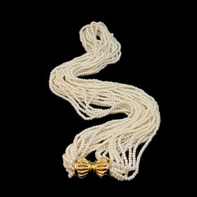 AN ELEGANT VINTAGE MULTI STRAND PEARL TORSADE NECKLACE BY LES BERNARD