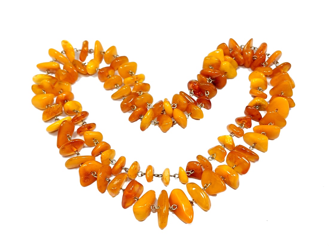BEAUTIFUL BALTIC BUTTERSCOTCH AMBER NECKLACE 32" LONG 36 GRAMS: OFFERED HERE IS A BEAUTIFUL BALTIC BUTTERSCOTCH AMBER NECKLACE, 32" LONG AND WEIGHING 36 GRAMS. ALL OUR AMBER IS TESTED. WE PROVIDE IN-HOUSE/COMBINED SHIPPING FOR YOUR CONVENIENCE.