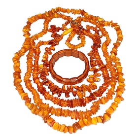 A LOT OF 4 NATURAL BALTIC AMBER NECKLACES AND A BRACELET 138 GRAMS