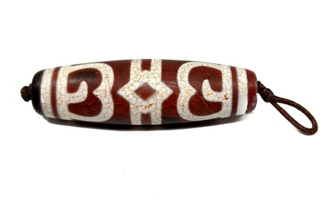 A FINE SINO-TIBETAN CARNELIAN AGATE DZI MASTER BEAD HUGE  70MM   23MM WIDE