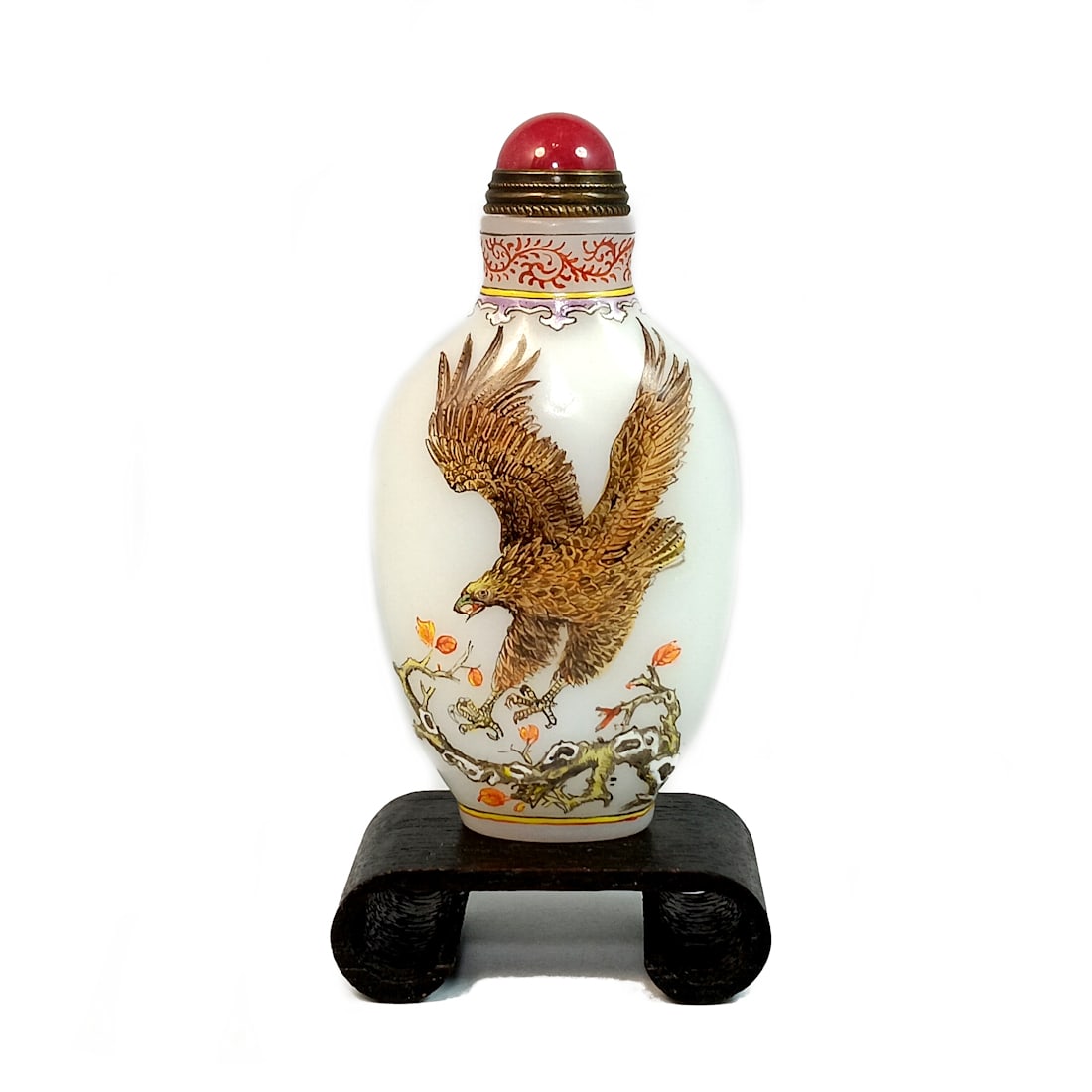 FINE CHINESE ENAMEL ON GLASS SNUFF BOTTLE EAGLE QIANLONG MARK: THE FINE CHINESE ENAMELED SNUFF BOTTLE DEPICTS TWO SCENES FEATURING EAGLES. THE BOTTLE BEARS A QIANLONG DATE MARK. IT IS 3.25" TALL. STANDS ARE FOR DISPLAY ONLY, NOT INCLUDED UNLESS OTHERWISE STATED. 