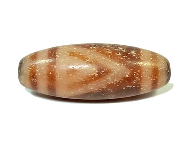 A FINE SINO TIBETAN AGATE DZI BEAD 40MM