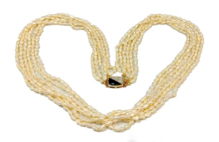 A BEAUTIFUL  VINTAGE MULTI STRAND PEARL NECKLACE 30"  121 GRAMS