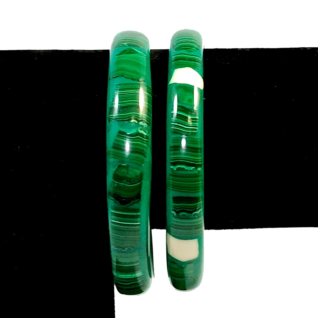 A LOT OF 2 MALACHITE GEMSTONE INLAID BANGLE BRACELET 2.5" D EACH: OFFERED HERE IS A LOT OF 2 MALACHITE GEMSTONE INLAID BANGLE BRACELETS. THEY WEIGH A TOTAL OF 67 GRAMS. INNER DIAMETERS ARE 2.5" EACH. SEE PHOTOS FOR COMPLETE DESCRIPTION. WE PROVIDEIN-HOUSE/COMBINED S