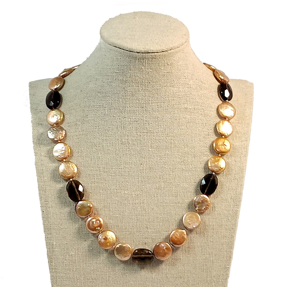 FRESHWATER GOLDEN COIN PEARL NECKLACE 14K GOLD CLASP SMOKEY QUARTZ: OFFERED HERE IS A FRESHWATER GOLDEN COIN PEARL NECKLACE, FEATURING A 14K GOLD CLASP AND FACETED SMOKEY QUARTZ BEADS. THE NECKLACE IS 18" LONG.WE PROVIDE IN-HOUSE/COMBINED SHIPPING FOR YOUR CONVENIENCE