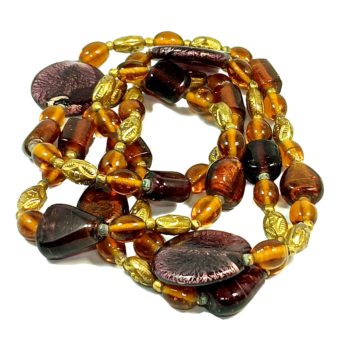 A HUGE ART GLASS BEADS NECKLACE 46" LONG PURPLE TOPAZ: OFFERED HERE IS A HUGE ART GLASS BEADS NECKLACE FEATURING PURPLE AND TOPAZ BEADS. IT IS 46" LONG. WE PROVIDE IN-HOUSE/COMBINED SHIPPING FOR YOUR CONVENIENCE.