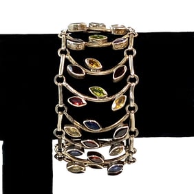 A WIDE JEWELED STERLING SILVER BRACELET 7.5" GARNET PERIDOT AMETHYST