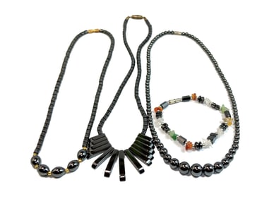 A LOT OF 3 HEMATITE NECKLACES AND A BRACELET