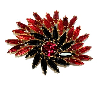 A VINTAGE RHINESTONE BROOCH VERIFIED JULIANA RED AND BLACK