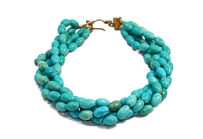 A STUNNING 4 STRAND TURQUOISE BEAD NECKLACE 17" LONG