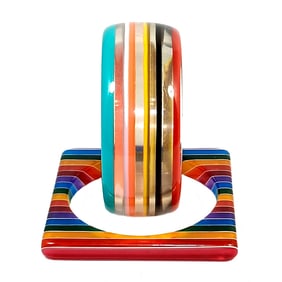 A WONDERFUL LOT OF 2 LAMINATED LUCITE BANGLES  2.5" DIAMETERS
