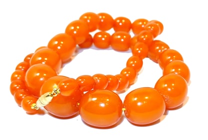 AN EXQUISITE BALTIC AMBER NECKLACE 21" AND 72 GRAMS