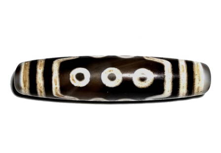 SUPERB SINO TIBETAN AGATE DZI BEAD 10 EYES 58 MM: THE SUPERB SINO TIBETAN DZI BEAD IS FEATURING 10 EYES AND A GEOMETRIC PATTERN WITH 4 STRIPES. IT FEATURES PATINA AND SOME OXIDATION. IT IS 58MM LONG. WE PROVIDE IN-HOUSE FREE SHIPPING WITHIN THE US.