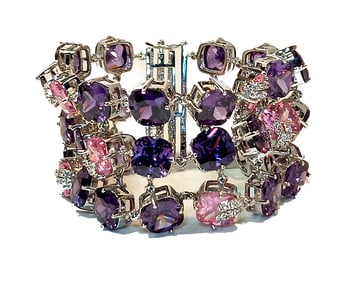 A STUNNING BRACELET WITH BIG CUBIC ZIRCONIA  STONES IN PRONGS  7.5" LONG