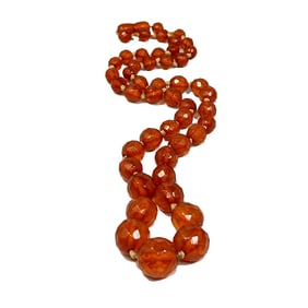 AN ANTIQUE NATURAL FACETED BALTIC AMBER NECKLACE 24" 40 GRAMS