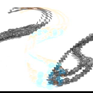 A FABULOUS VINTAGE LIQUID SILVER NATIVE AMERICAN BLUE CORAL NECKLACE 26": THE FABULOUS VINTAGE NATIVE AMERICAN 2 STRANDS NECKLACE INCLUDES BLUE CORAL AND LIQUID SILVER. THE NECKLACE IS 26" LONG AND WEIGH 59.5 GRAMS. WE PROVIDE FREE IN-HOUSE SHIPPING WITHIN THE U.S.