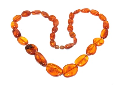 A SUPERB BALTIC AMBER NECKLACE 28"  57 GRAMS