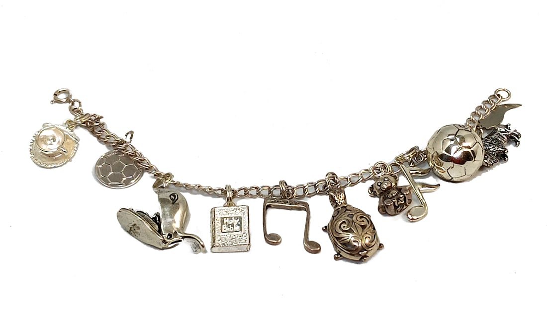 A FINE VINTAGE STERLING CHARM  BRACELET  6.75" LONG (1 of 5)