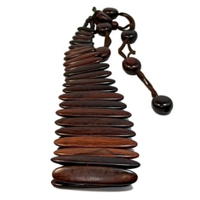 A BEAUTIFUL VINTAGE ROSEWOOD BELT 40" LONG