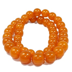A FABULOUS LARGE BALTIC AMBER NECKLACE 89 GRAMS 26"