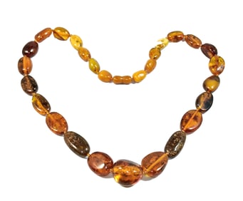 A NATURAL BALTIC AMBER NECKLACE GRADUATED OVAL BEADS 43 GRAMS 22"