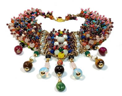 AN IMPORTANT MASSIVE GEMSTONE BIB NECKLACE SIGNED BY DESIGNER STEFAN DINU: OFFERED HERE IS AN IMPORTANT, MASSIVE GEMSTONE BIB NECKLACE SIGNED BY DESIGNER STEFAN DINU. IT IS ONE OF A KIND AND ABSOLUTELY BREATHTAKING. SOME OF THE GEMSTONES INCLUDED ARE ROCK CRYSTAL, CARNELIAN,